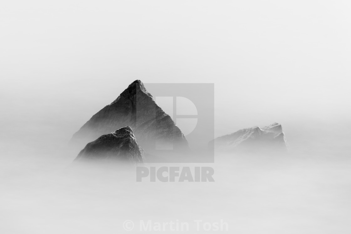 "Rocks in sea long exposure ii mono" stock image