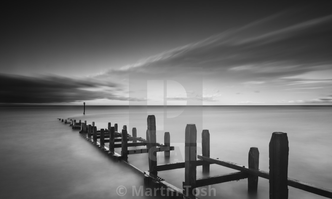 "Old sea defences long exposure mono." stock image