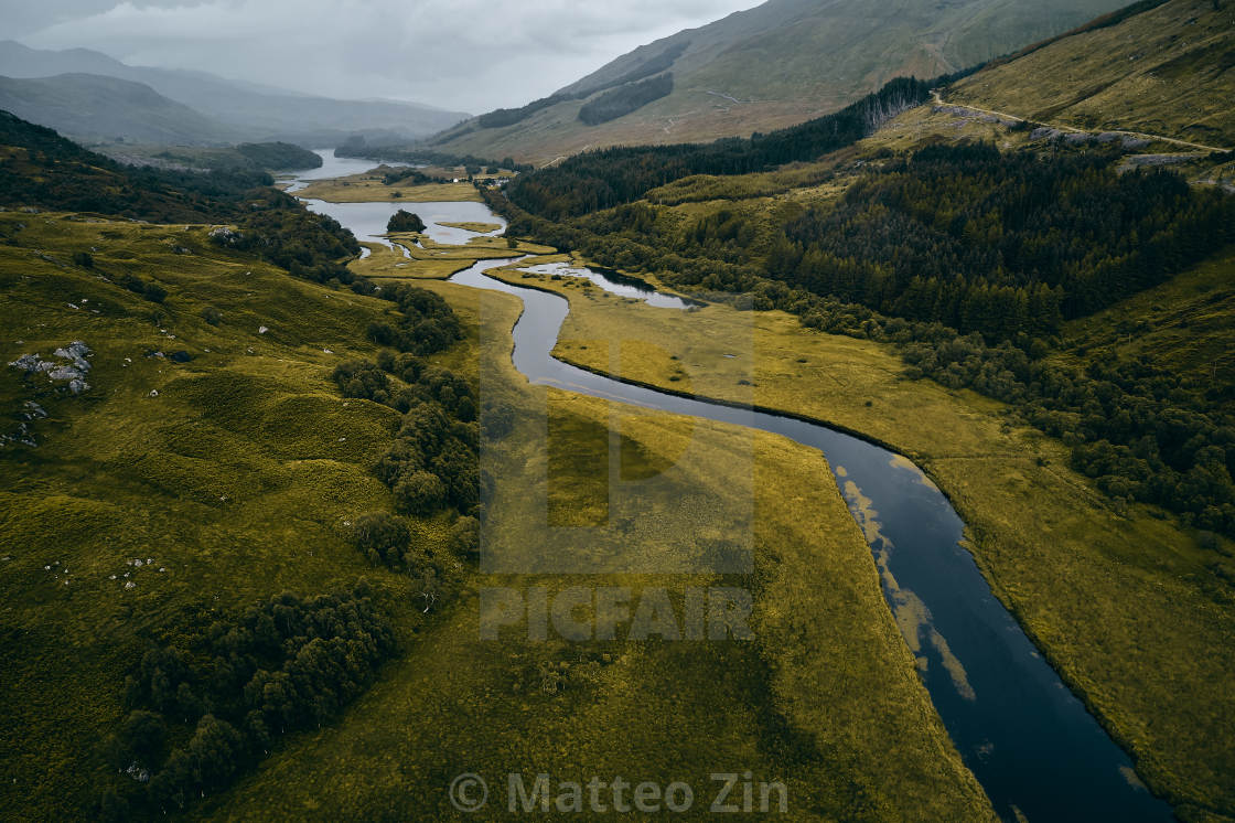 "Aerial view of Scotland lake and river into the mountains" by Matteo Zin - $30.28 "Aerial view of Scotland lake and river into the mountains" stock image