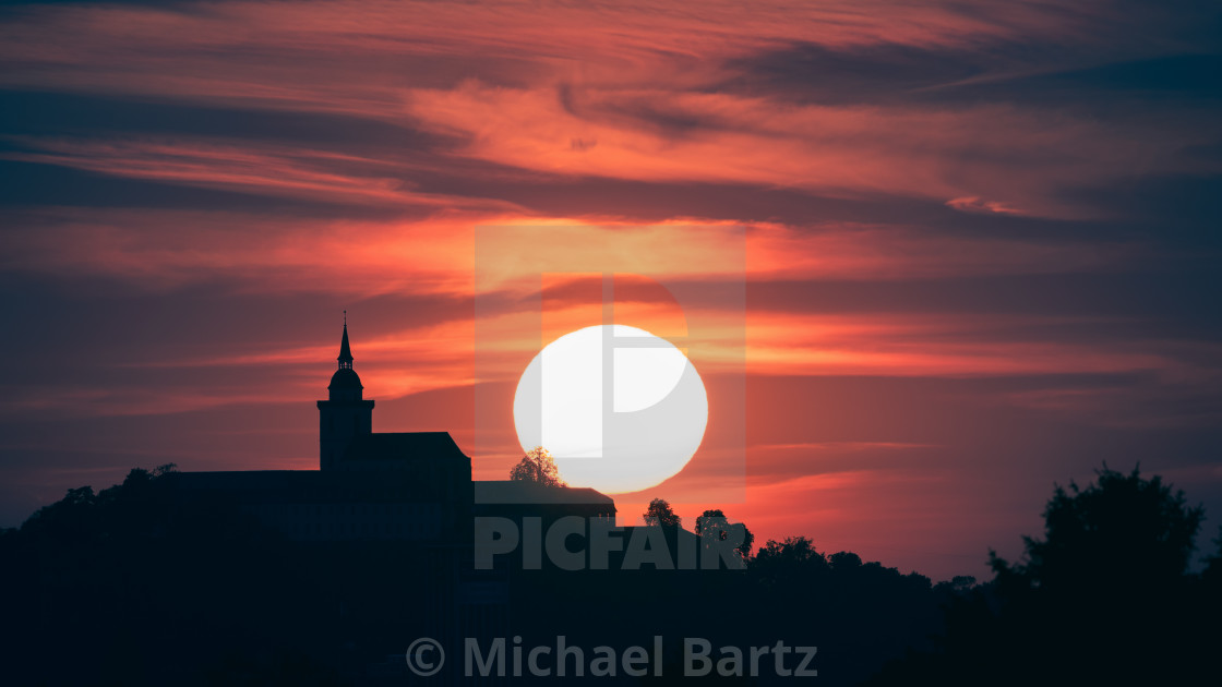 "Sonnenuntergang über dem Michaelsberg Siegburg" by Michael Bartz - $7.71 "Sonnenuntergang über dem Michaelsberg Siegburg" stock image