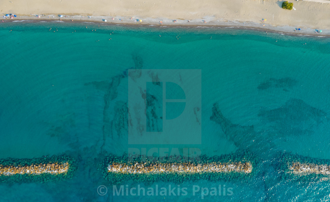 "Aerial view from flying drone of people relaxing on the beach. Paphos Cyprus" stock image