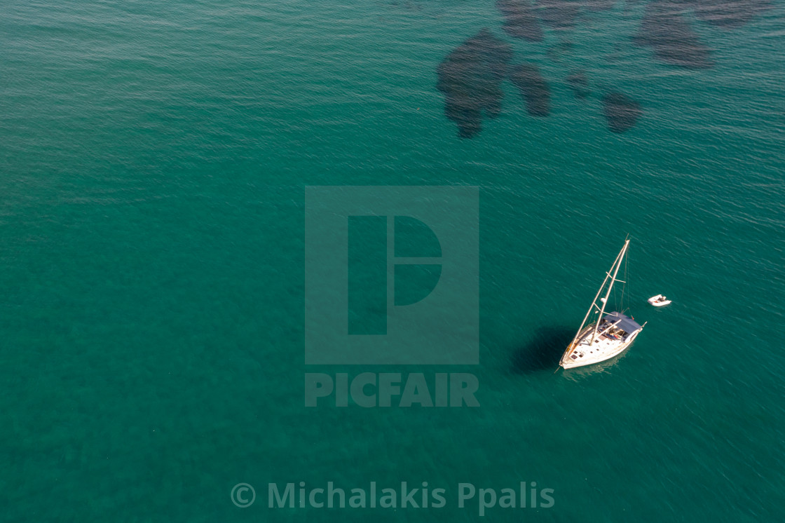 "Aerial view of a luxury yacht anchored in the surface of the sea. Cyprus vacations" stock image