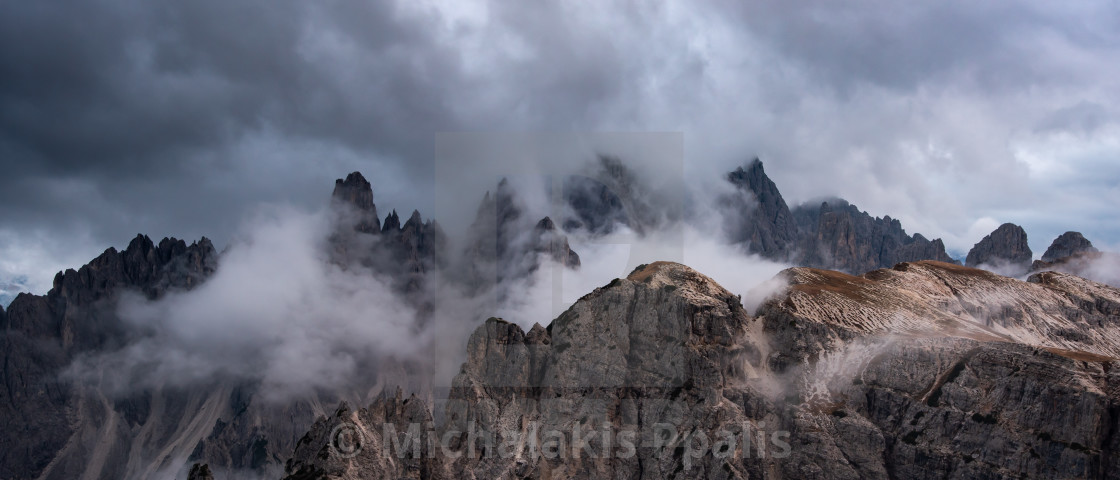 "Mountain landscape with mist, at sunset. at Tre Cime di lavaredo, Italian dolomites a in South Tyrol in Italy." stock image