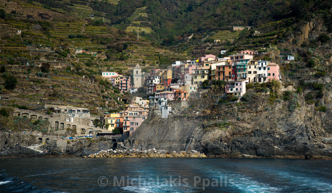 "Village of vernazza with colourful houses at the edge of the cliff Riomaggiore, Cinque Terre, Liguria, Italy" stock image