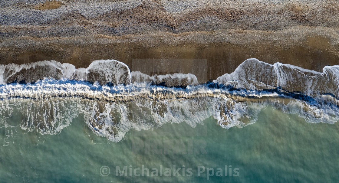 "Aerial view of stormy ocean waves breaking on a beach. Nature background" stock image