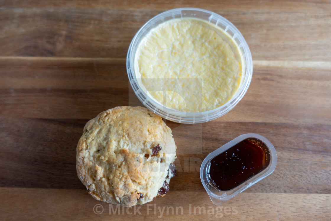 "scones with clotted cream and jam" stock image