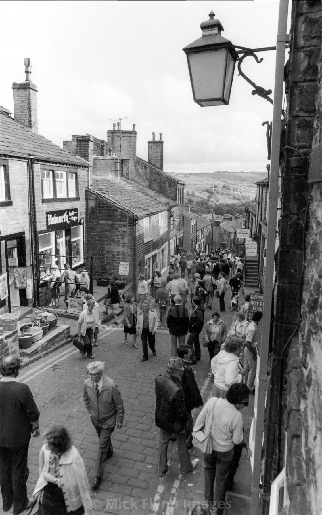 "Haworth main street, West Yorkshire circa 1982 black and white archive image...." stock image