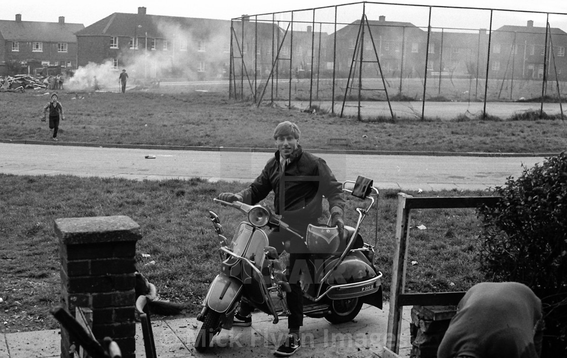 "Young man with motor scooter Brafferton Arbor, Buttershaw Estate, Bradford,..." stock image