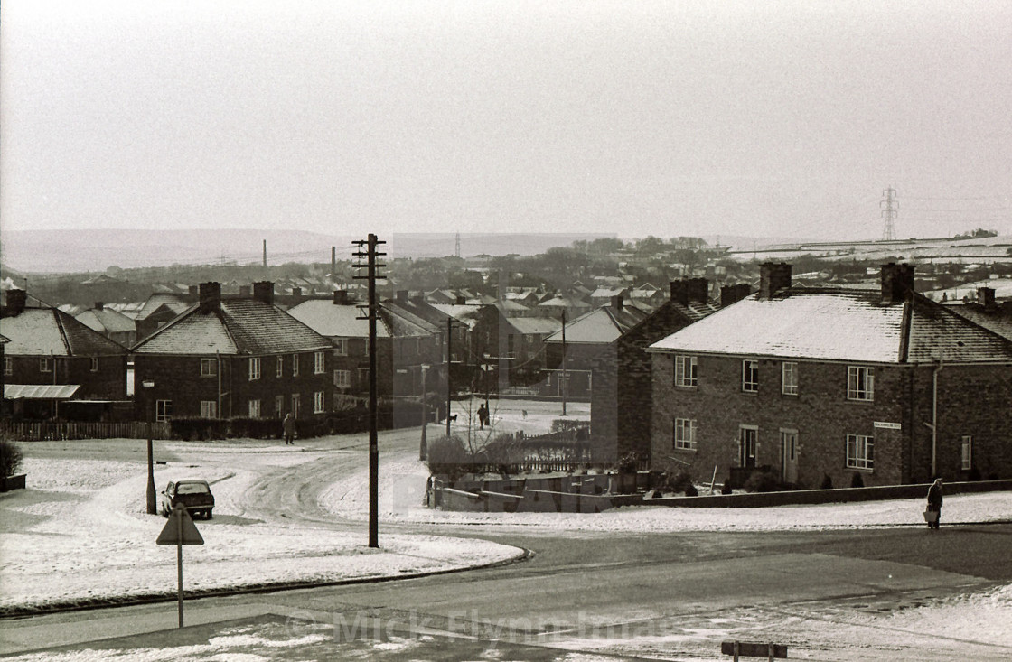 "Winter snow covered views of council estate housing in Buttershaw Bradford 1982" stock image