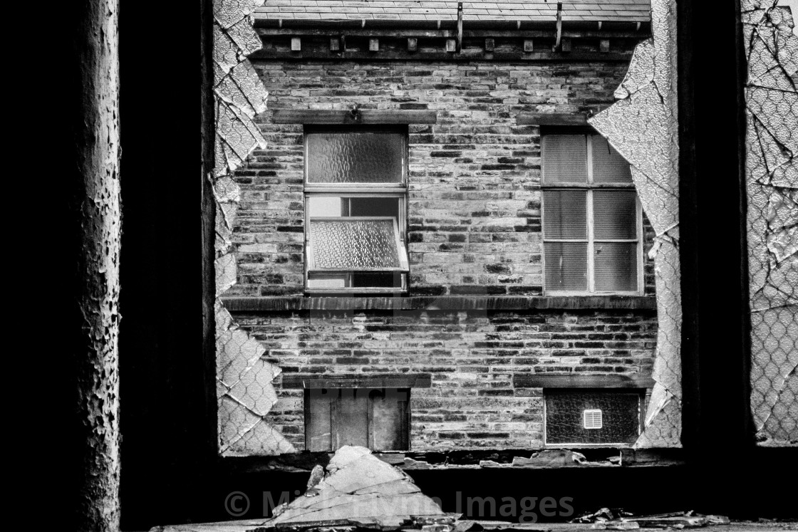 "Thompsons Mill, Fulton Street, Tetley Street, Thornton Road Bradford, West Yorkshire. Interior view. An image from my series 'Monochrome Mill Town', black and white studies of around the northern Wool City of Bradford, West Yorkshire." stock image