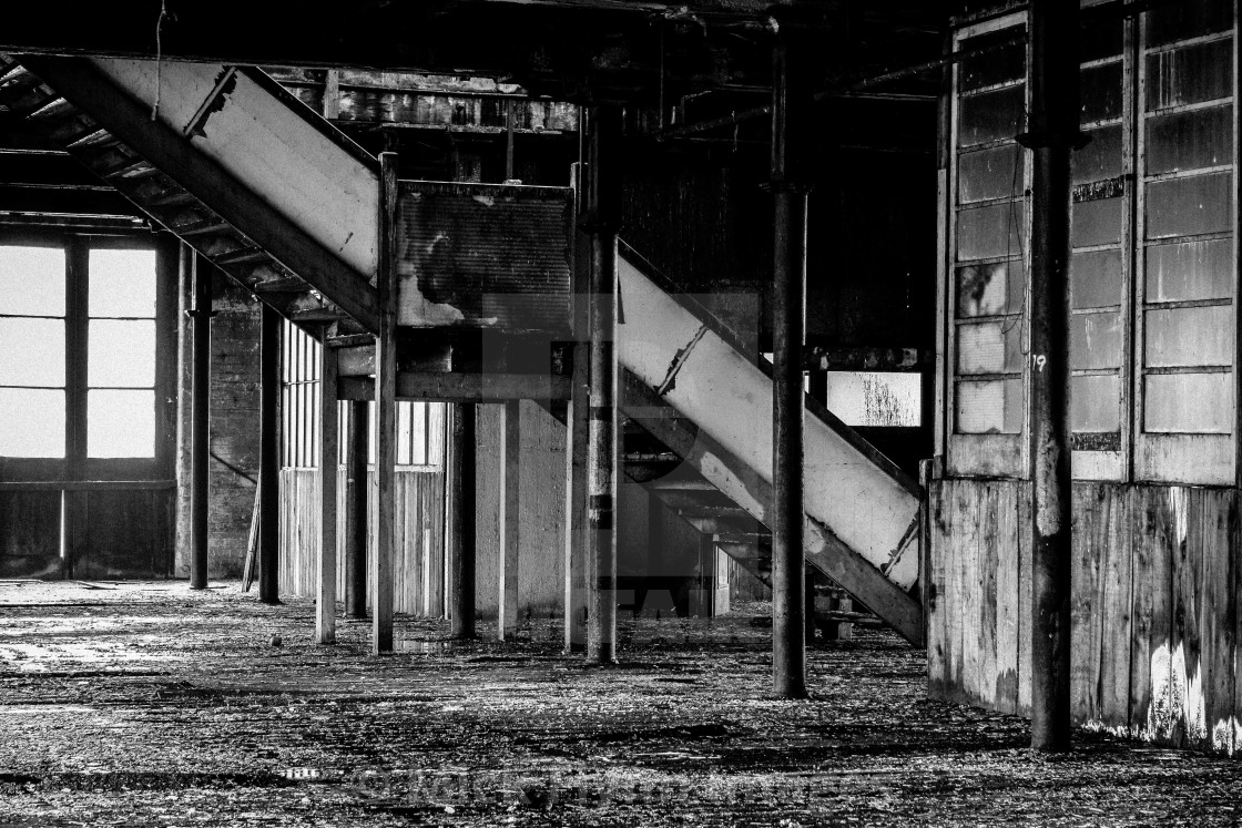 "Thompsons Mill, Fulton Street, Tetley Street, Thornton Road Bradford, West Yorkshire. Interior view. An image from my series 'Monochrome Mill Town', black and white studies of around the northern Wool City of Bradford, West Yorkshire." stock image