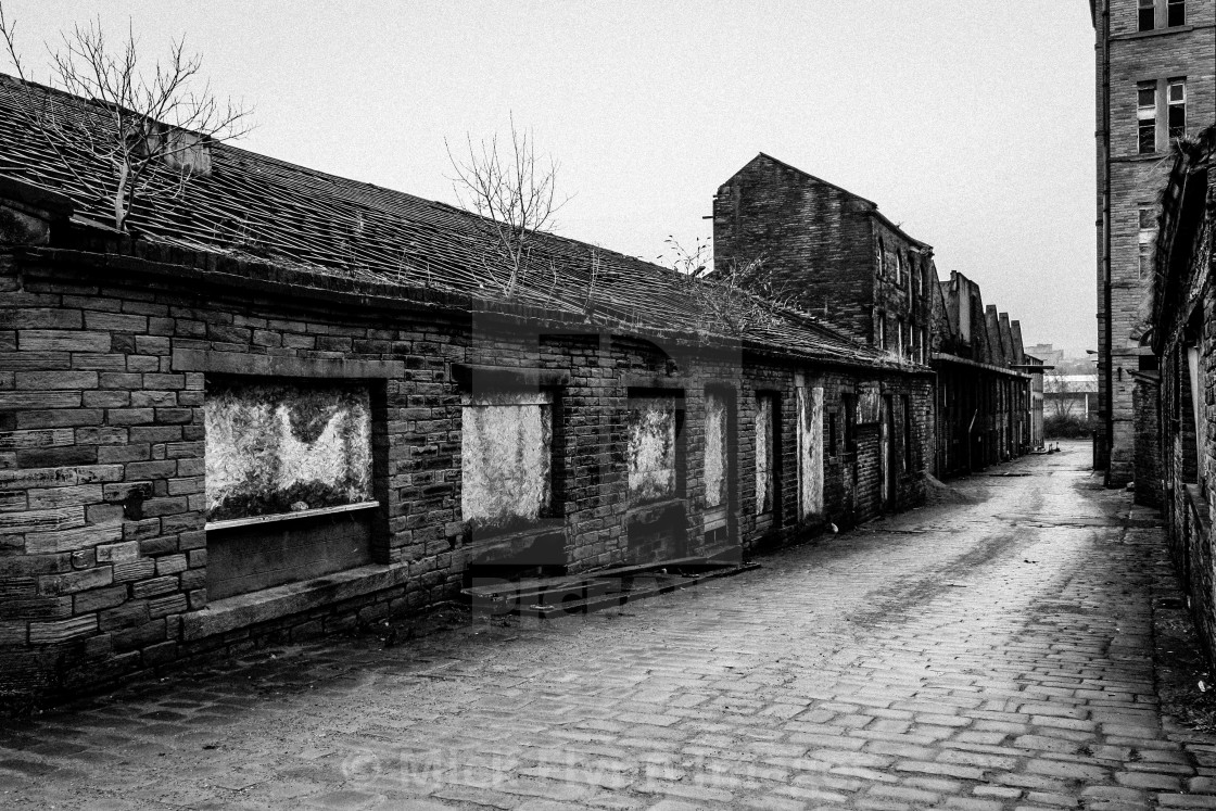 "Daniel Illingworth's worsted spinning Mill, Thornton Road. An image from my series 'Monochrome Mill Town', black and white studies of around the northern Wool City of Bradford, West Yorkshire." stock image