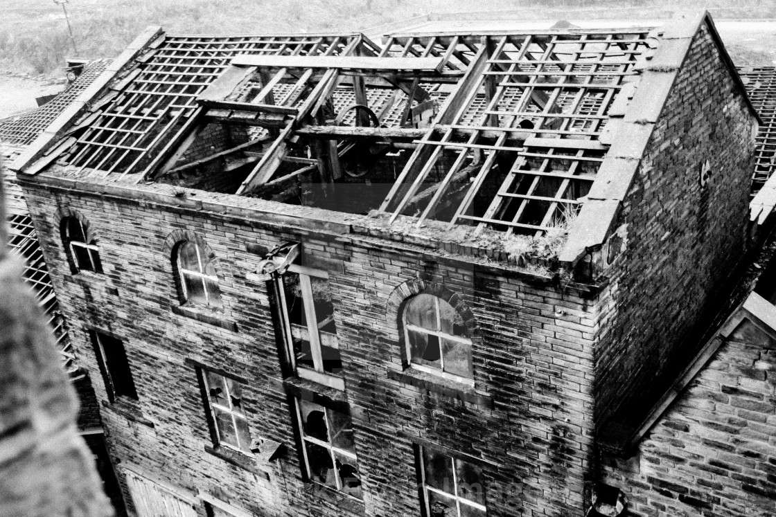 "Daniel Illingworth's worsted spinning Mill, Thornton Road. An image from my series 'Monochrome Mill Town', black and white studies of around the northern Wool City of Bradford, West Yorkshire." stock image