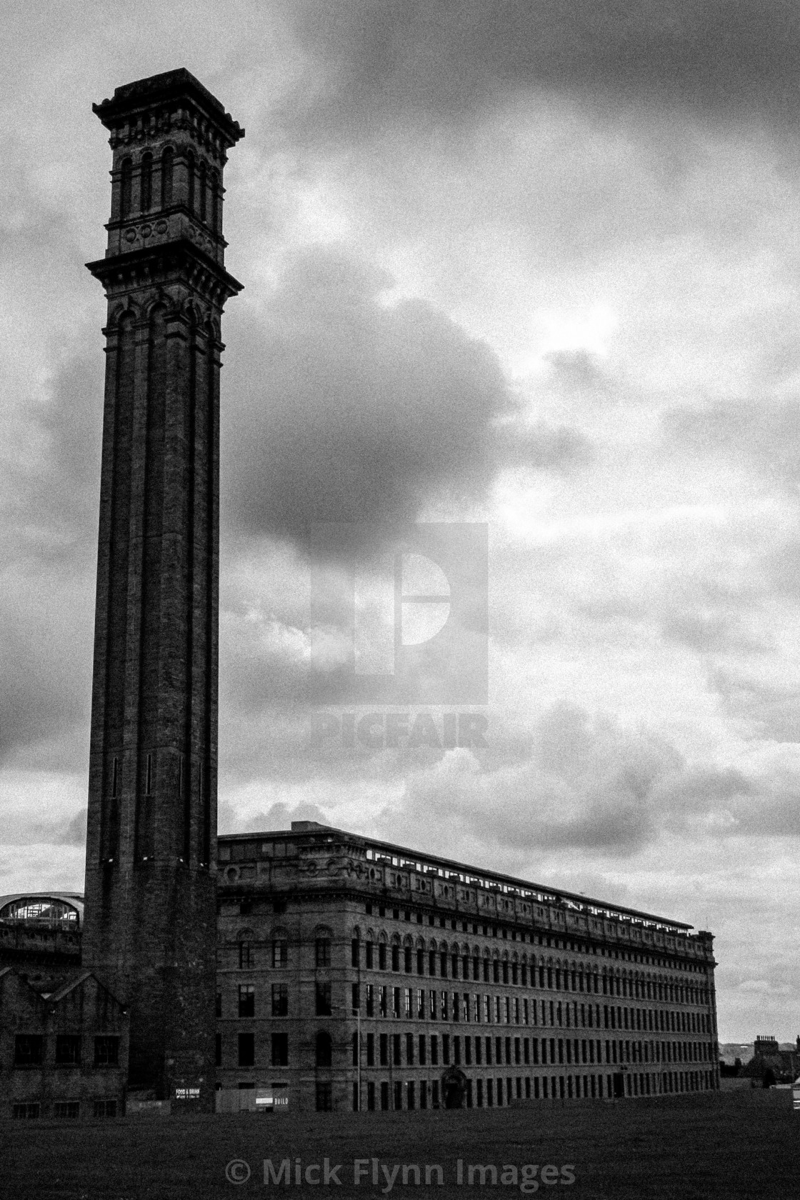 "Listers Mill and chimney, Bradford, West Yorkshire. An image from my series 'Monochrome Mill Town', black and white studies around the northern Wool City of Bradford, West Yorkshire." stock image