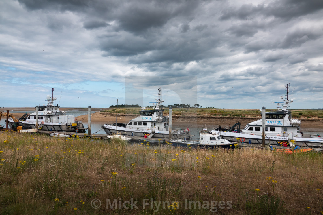 "Seacat services, offshore support vessels moored in Wells-next-the-sea North..." stock image