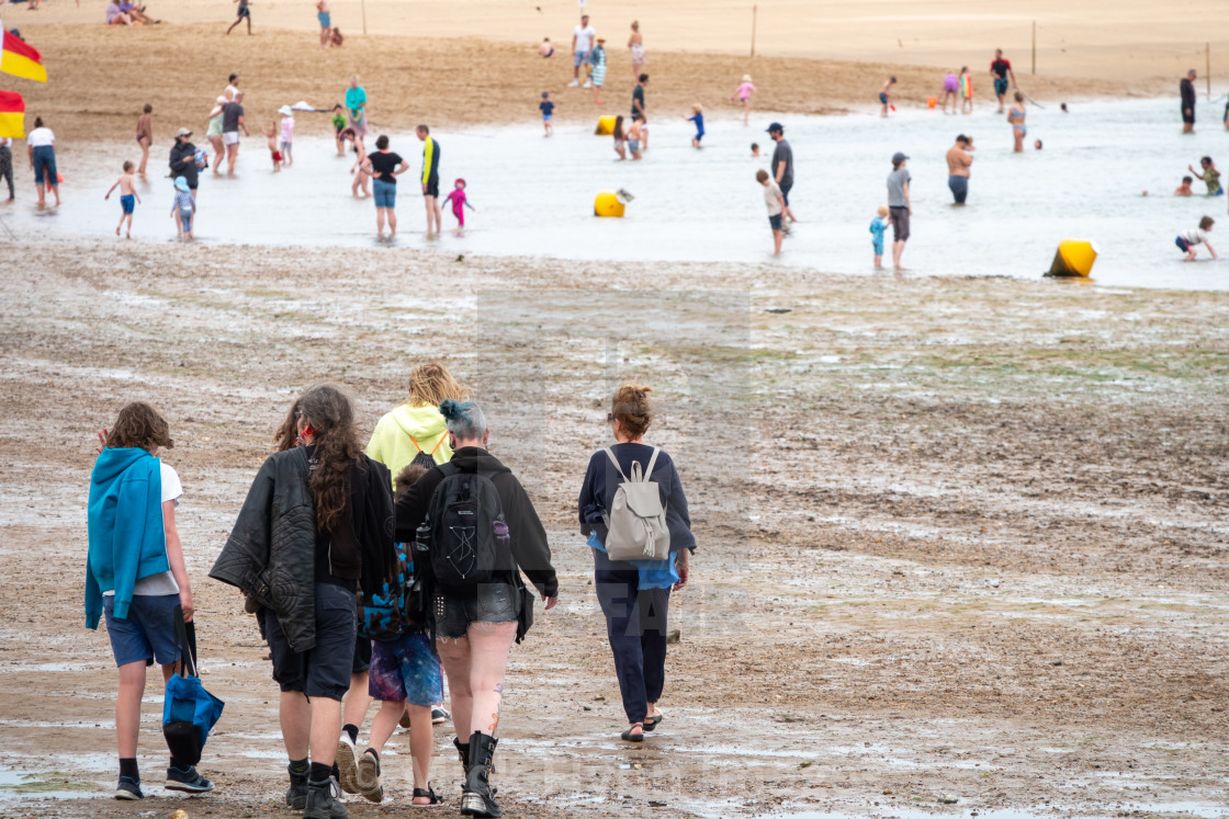 "Wells-next-the-sea North Norfolk, UK, a Muslim staycationer family walk on..." stock image