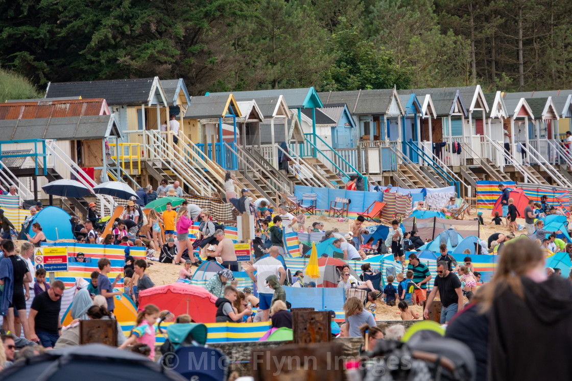 "Wells-next-the-sea North Norfolk, UK, families on the crowded beach with..." stock image