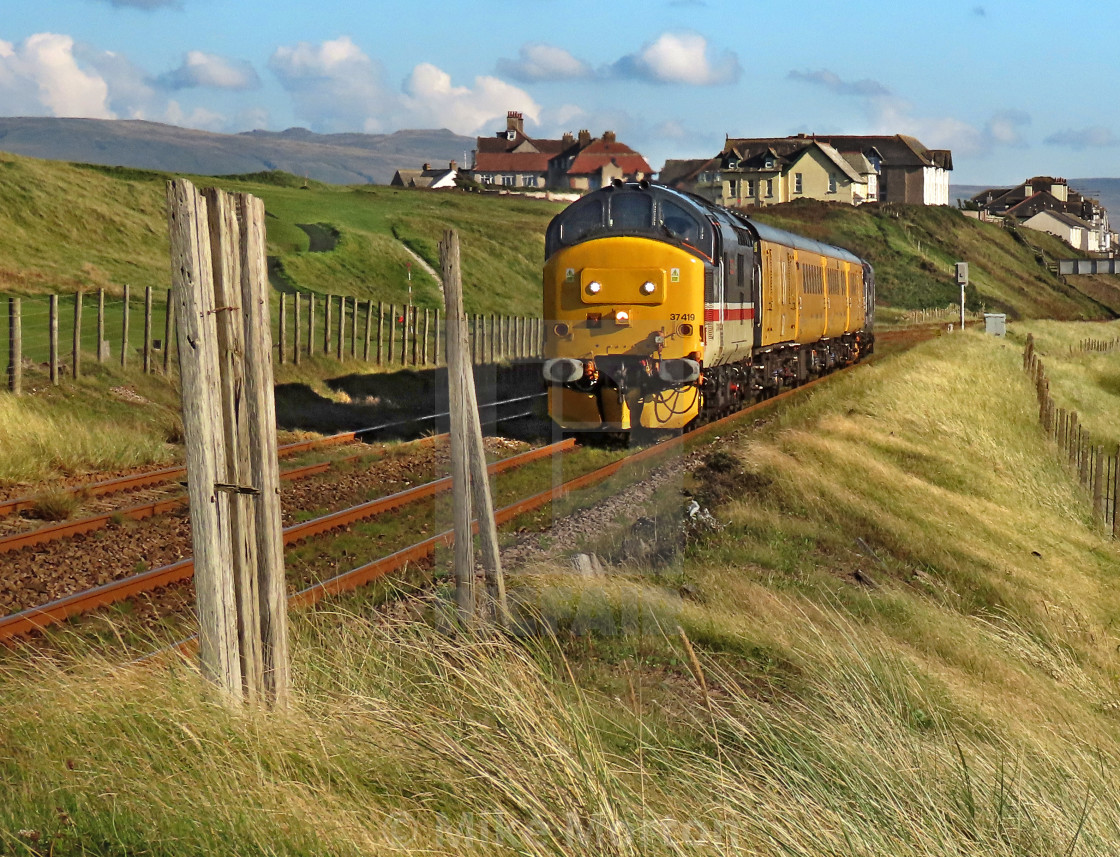 "Tractor on the Cumbrian Coast" stock image