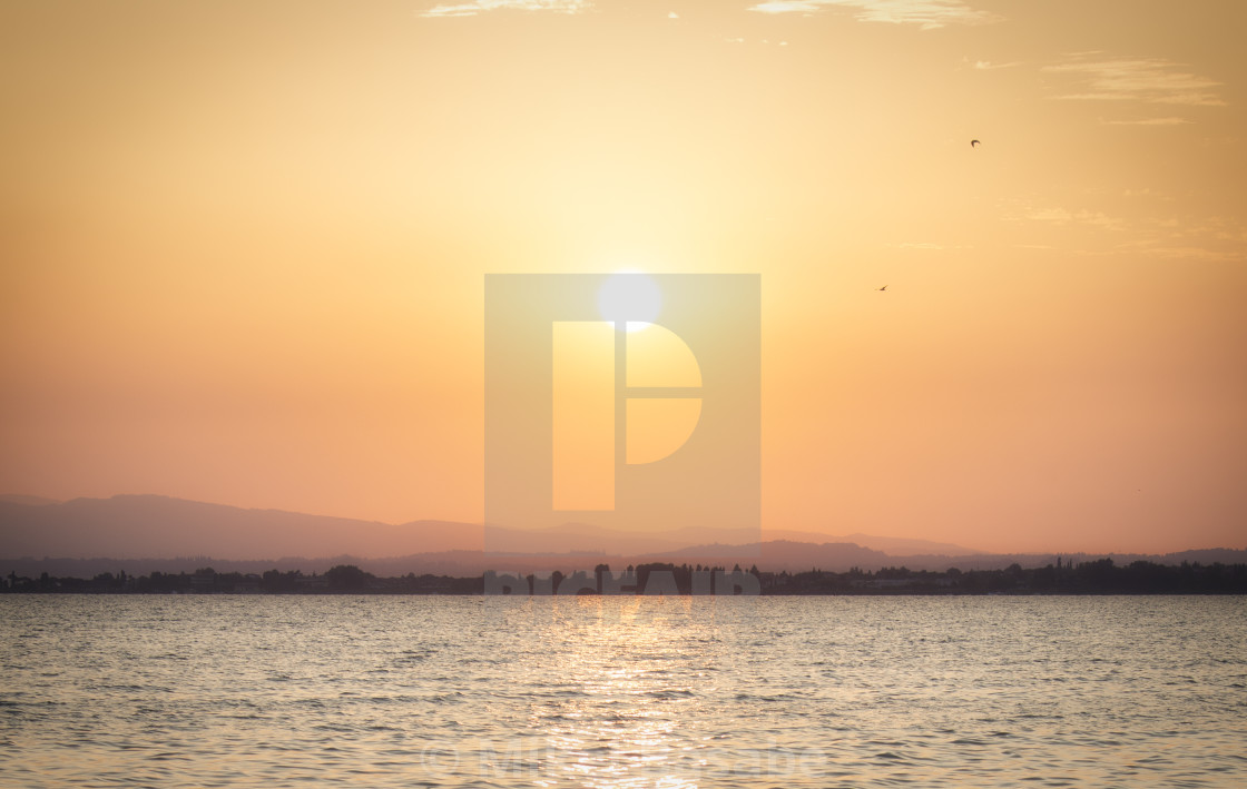 "Sunrise in Lake Garda over Sirmione" stock image