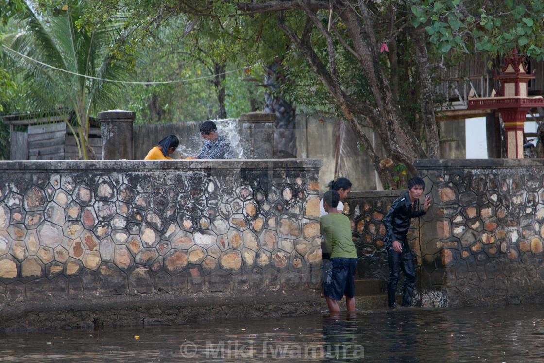 "Water Fight" by Miki Iwamura - $46.16 "Water Fight" stock image