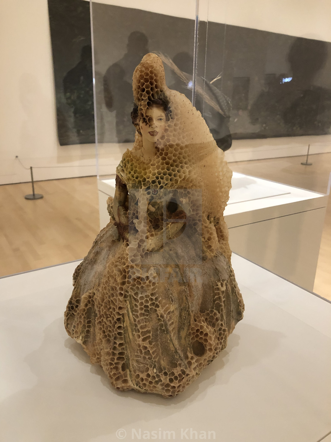"Figurite of a girl made by honey comb" by Nasim Khan - £18.60 "Figurite of a girl made by honey comb" stock image