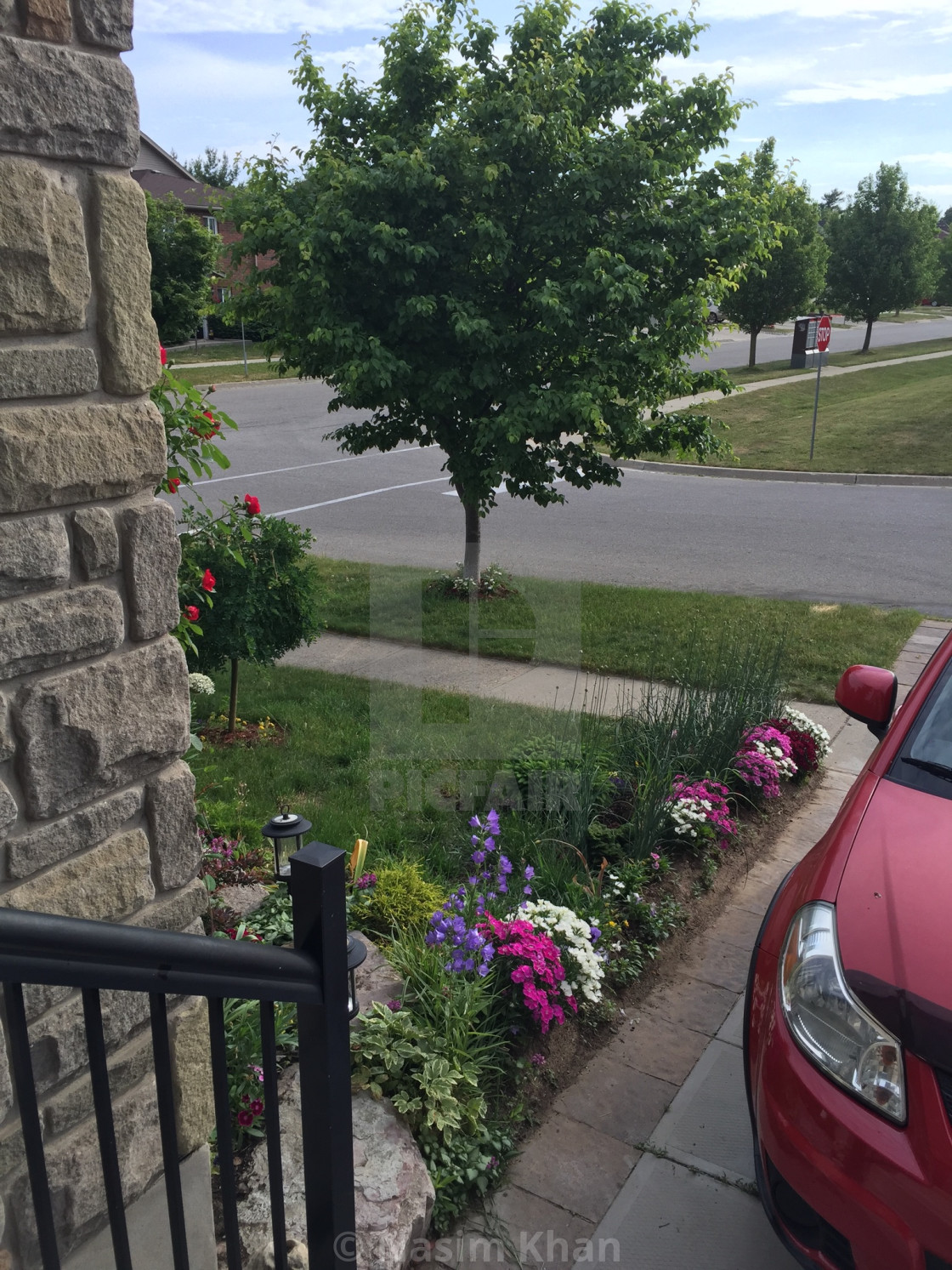 "Main Entrance of a House in Summer" by Nasim Khan - £12.40 "Main Entrance of a House in Summer" stock image