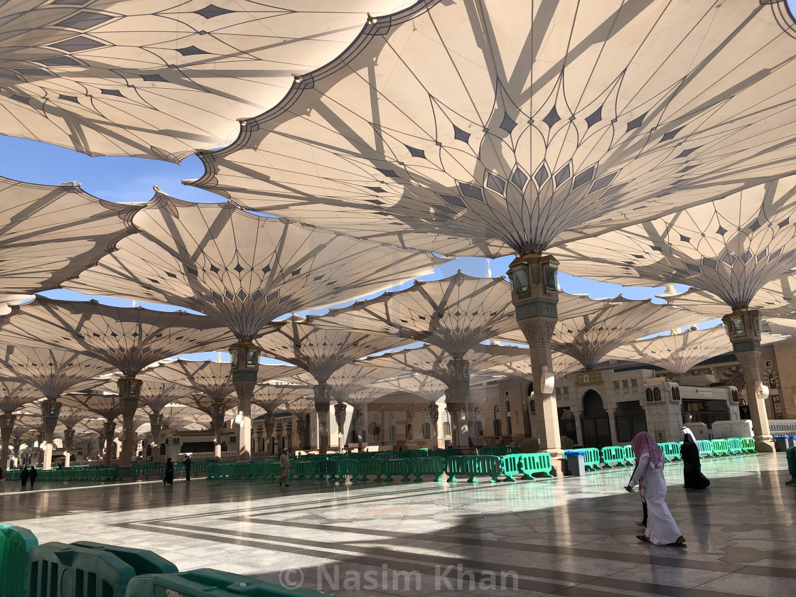 "Folding Umbrellas of Madinah" by Nasim Khan - £24.80 "Folding Umbrellas of Madinah" stock image