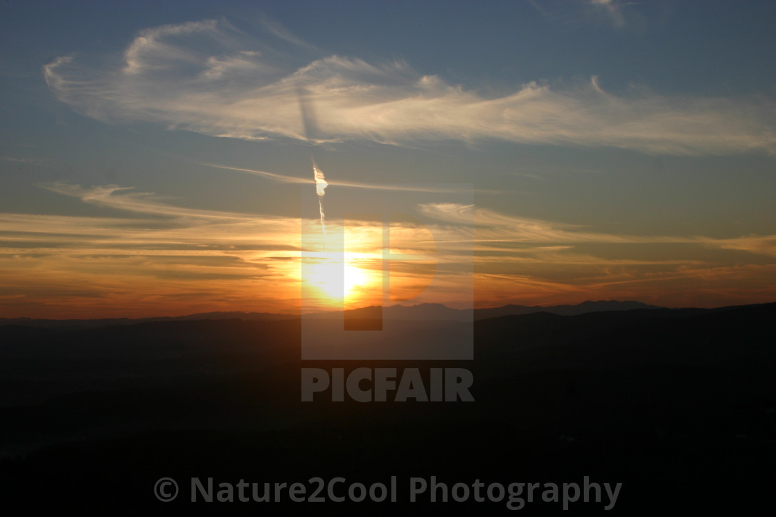 "Sunset flares crosses the sky" by Nature2Cool Photography - $19.05 "Sunset flares crosses the sky" stock image