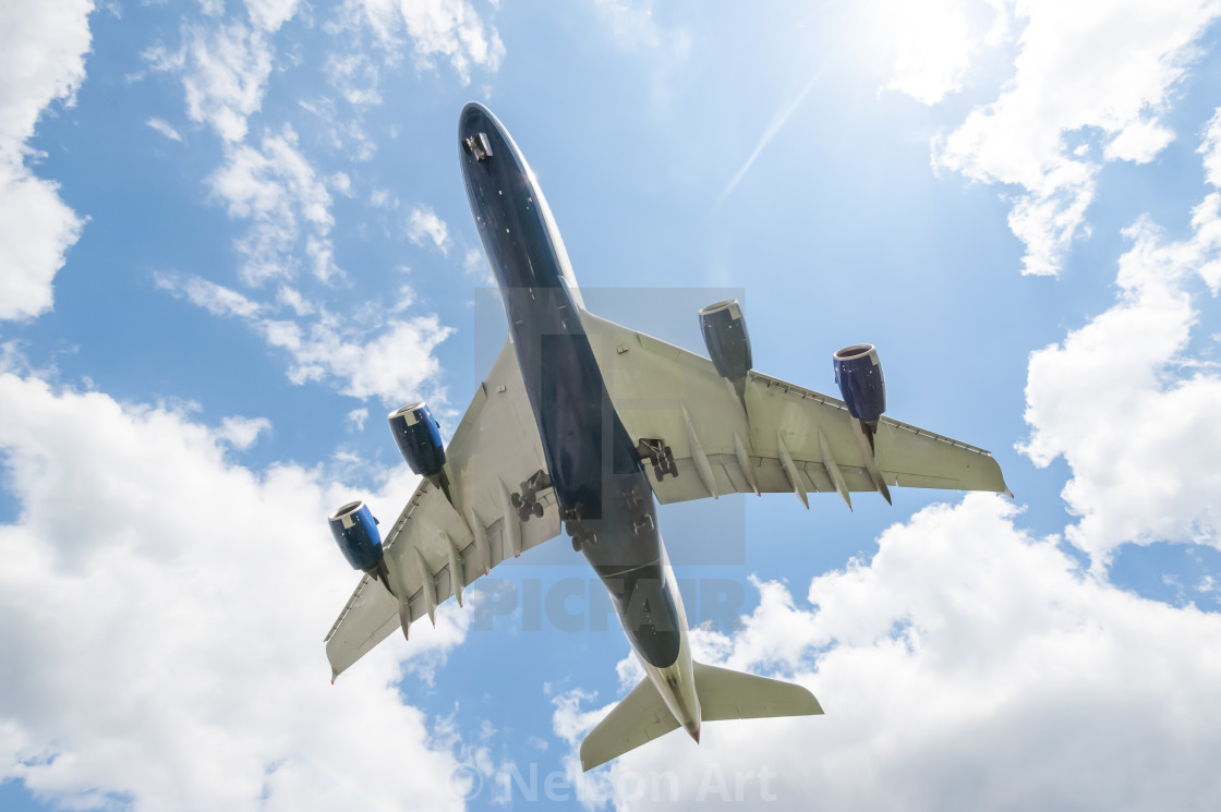 "wide-body passenger jet landing" by Nelson Art - £5.00 "wide-body passenger jet landing" stock image