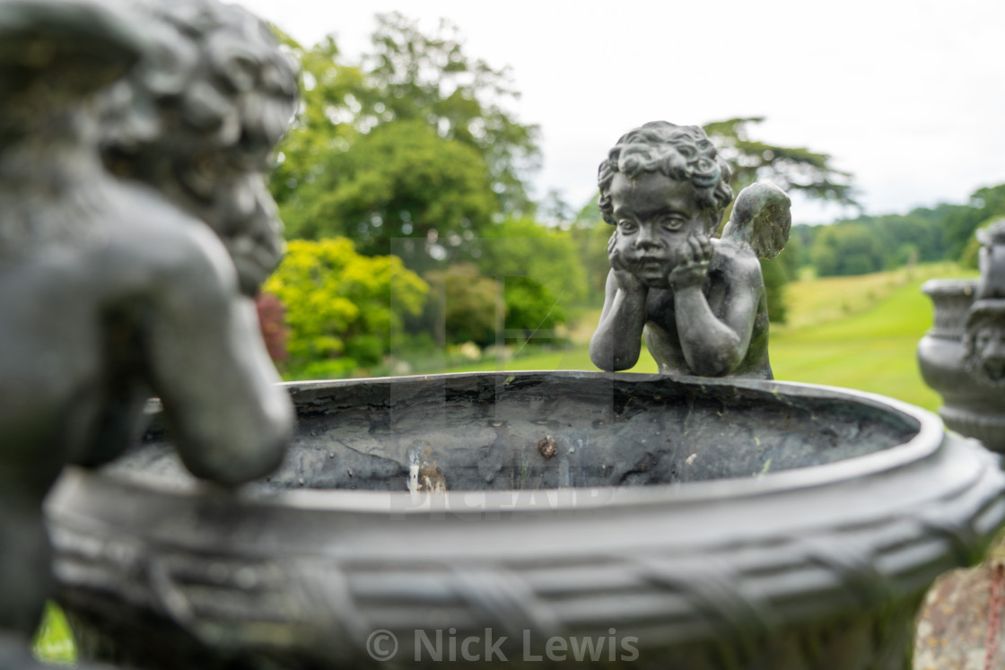 "Cherub decoration large garden pots" stock image