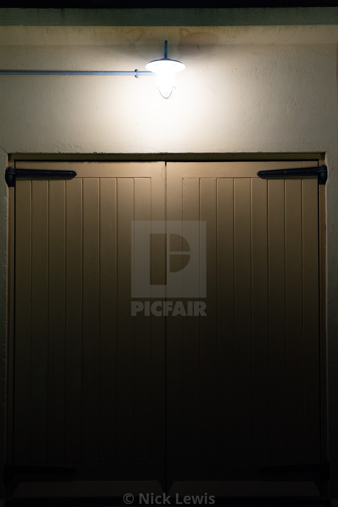 "Warehouse doorway at night" stock image