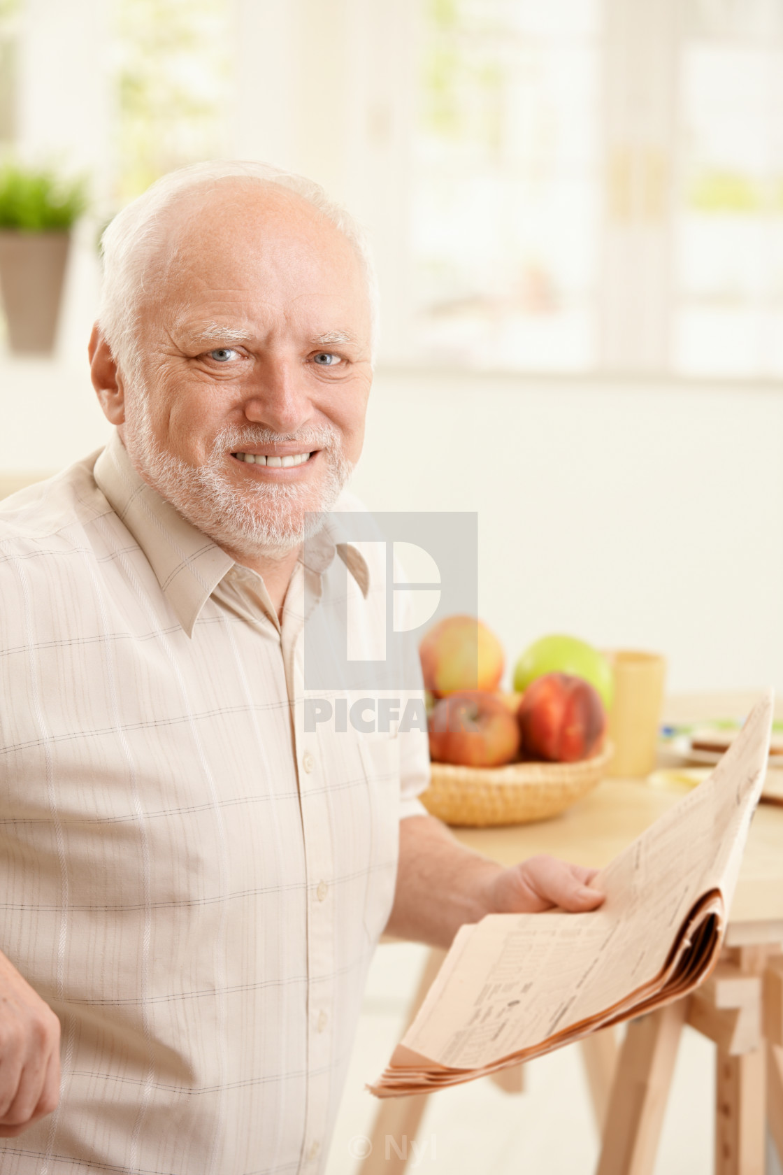 "Portrait of senior man at breakfast" stock image