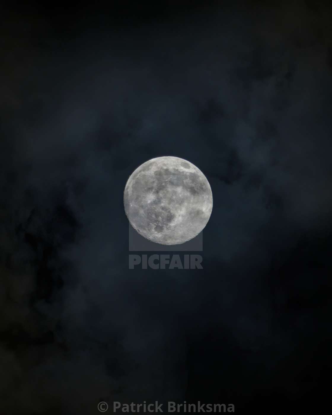 "Moon In Clouds" by Patrick Brinksma - $12.24 "Moon In Clouds" stock image