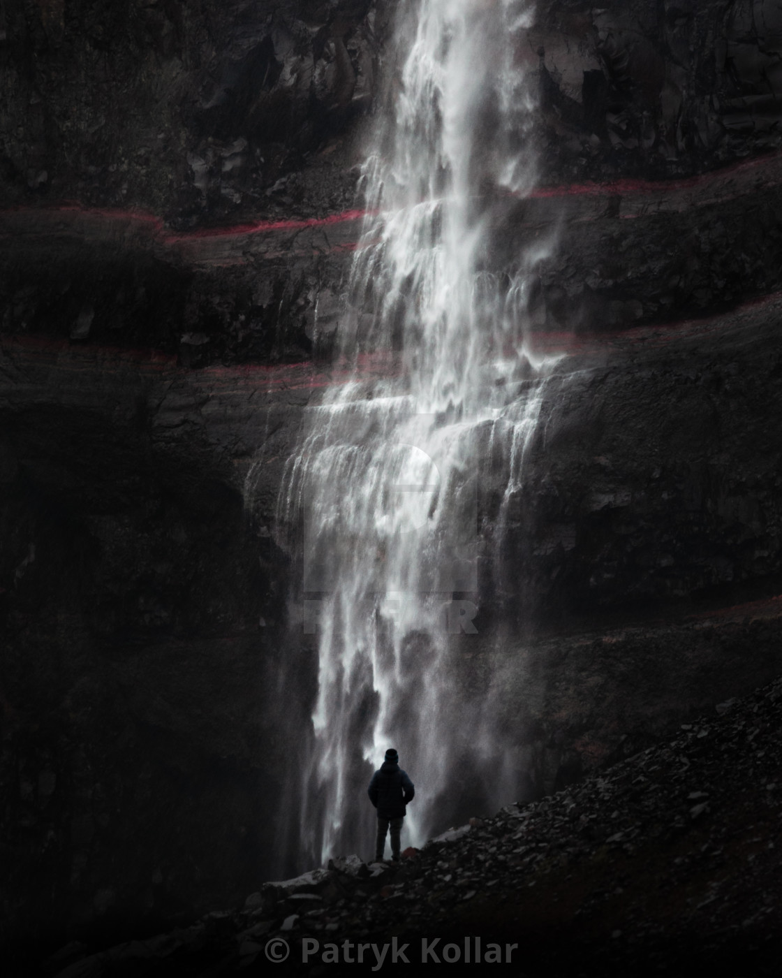 "Person overlooking Hengifoss" by Patryk Kollar - £24.80 "Person overlooking Hengifoss" stock image