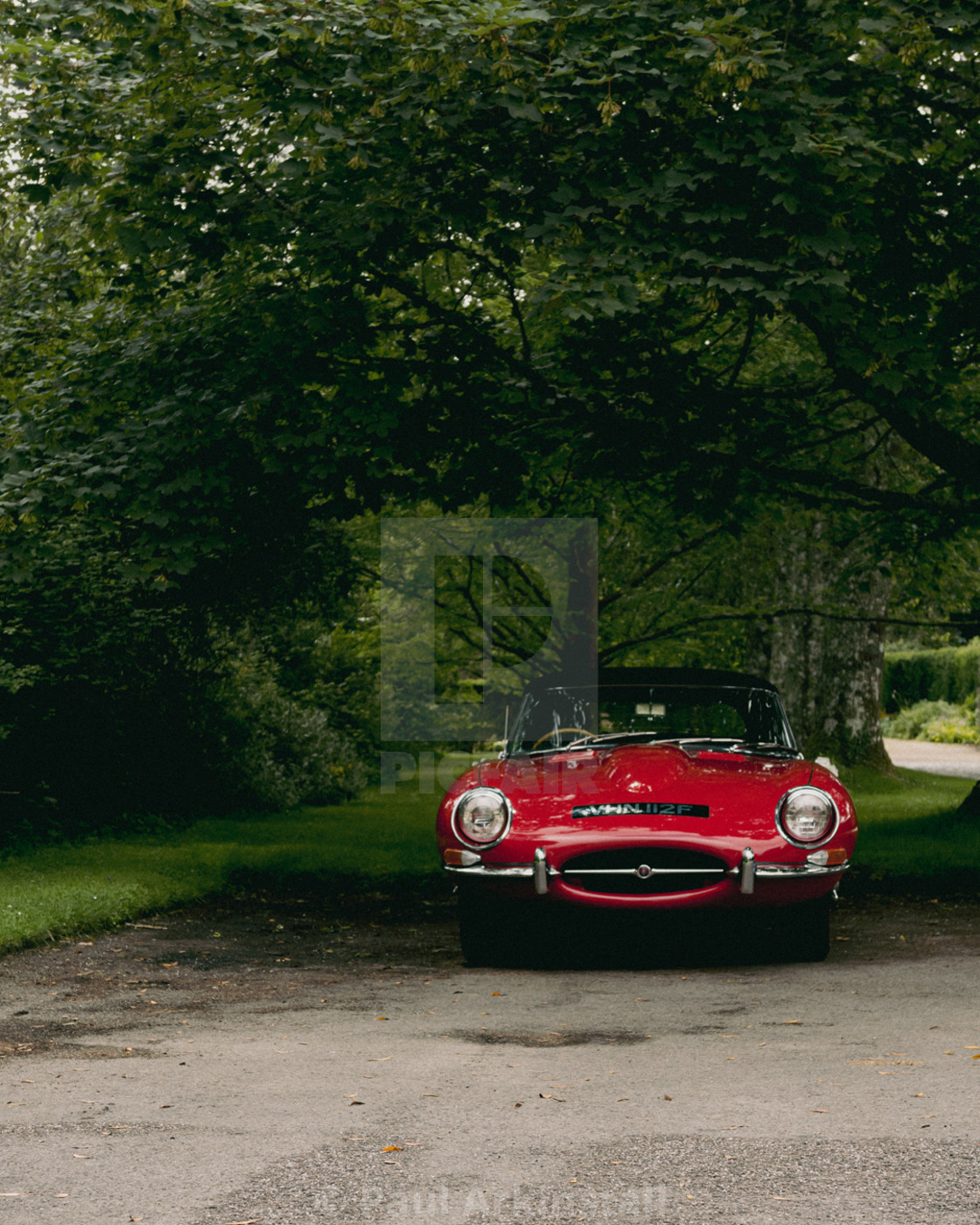 "A waiting Jaguar E-Type" by Paul Arkinstall - £4.96 "A waiting Jaguar E-Type" stock image