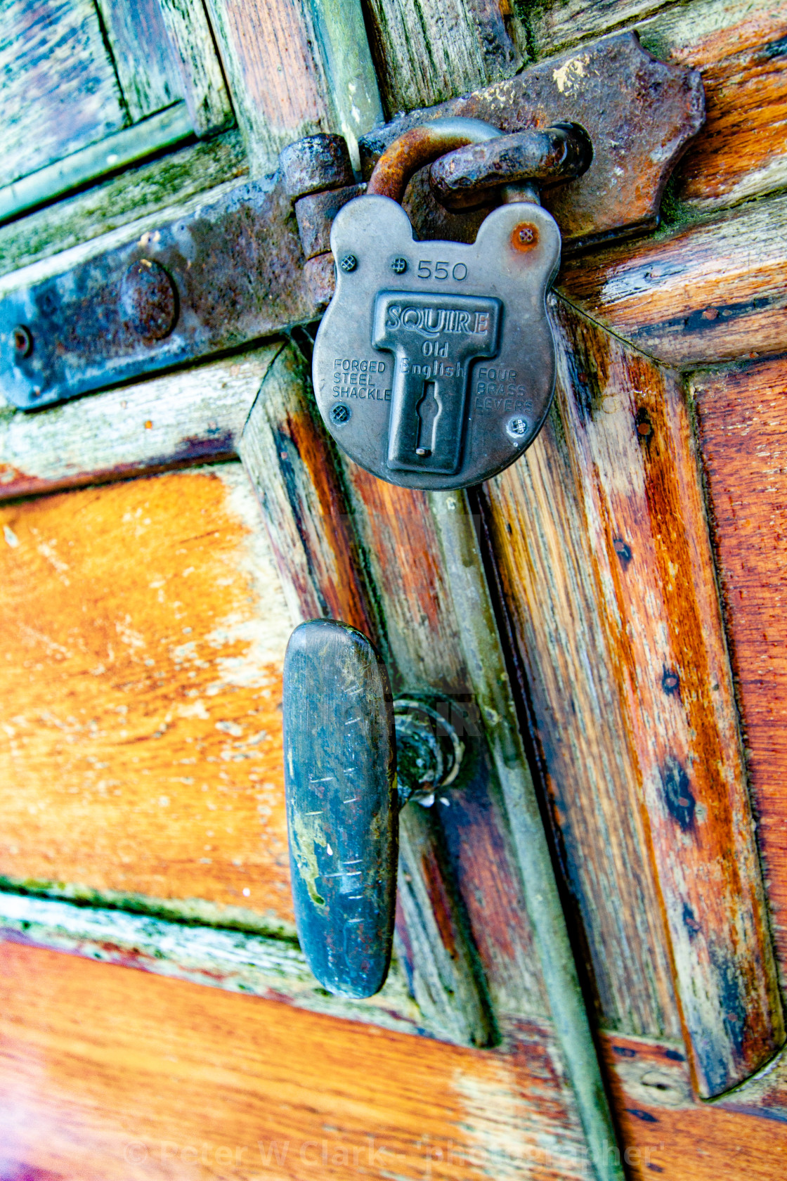 "Vintage carriage/Saloon Door and Padlock Detail on display at Embsay and Bolton Abbey Steam Railway" by Peter W. Clark - 'photographer' - £10.00 "Vintage carriage/Saloon Door and Padlock Detail on display at Embsay and Bolton Abbey Steam Railway" stock image