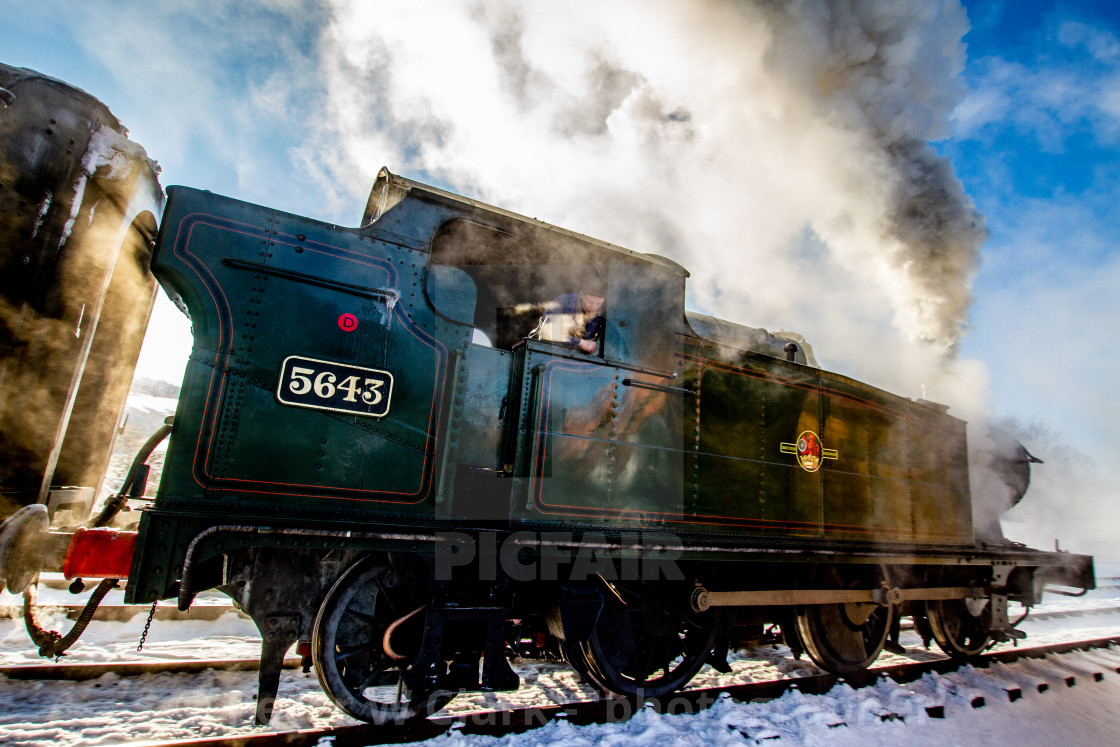 "Locomotive no. 5643, Class 5600, Origin GWR in use at Embsay and Bolton Abbey Steam Railway" by Peter W. Clark - 'photographer' - £35.00 "Locomotive no. 5643, Class 5600, Origin GWR in use at Embsay and Bolton Abbey Steam Railway" stock image