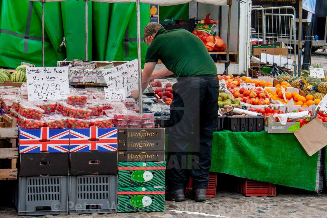 "Cobbled Market Place, market stall displaying and selling fruit.Richmond, North Yorkshire." by Peter W. Clark - 'photographer' - £15.00 "Cobbled Market Place, market stall displaying and selling fruit.Richmond, North Yorkshire." stock image
