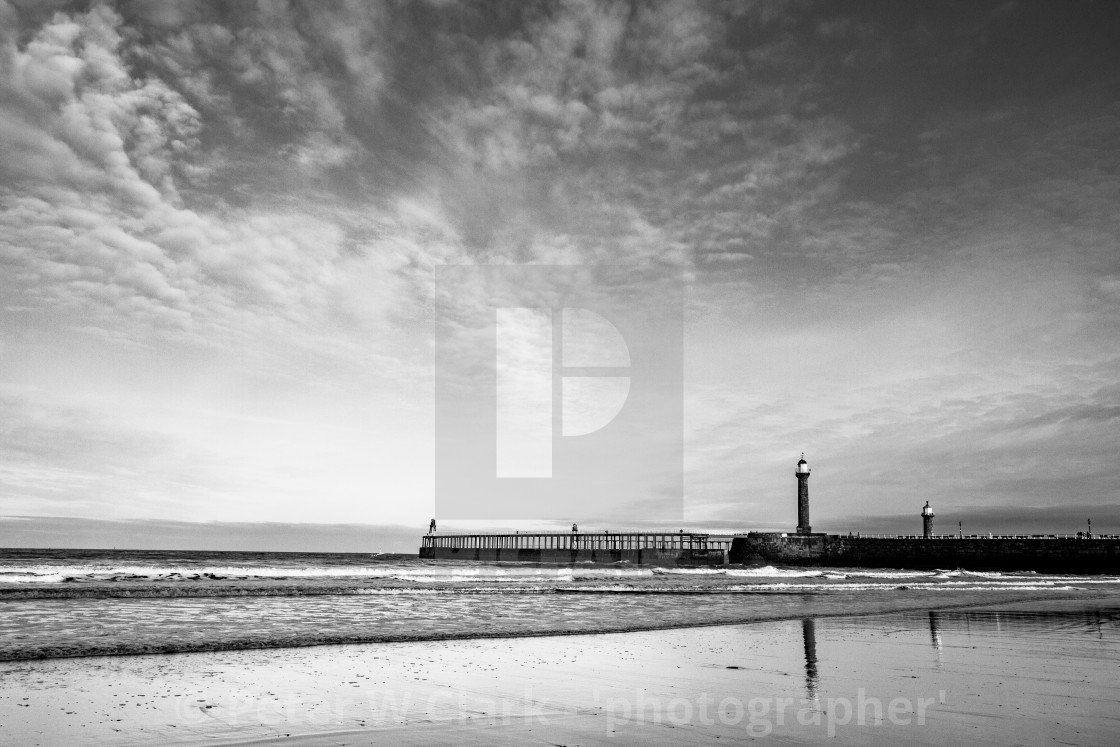 "Whitby, UK, Beach, Pier,lighthouse and Reflection. Monochrome and Copy Space." by Peter W. Clark - 'photographer' - £20.00 "Whitby, UK, Beach, Pier,lighthouse and Reflection. Monochrome and Copy Space." stock image