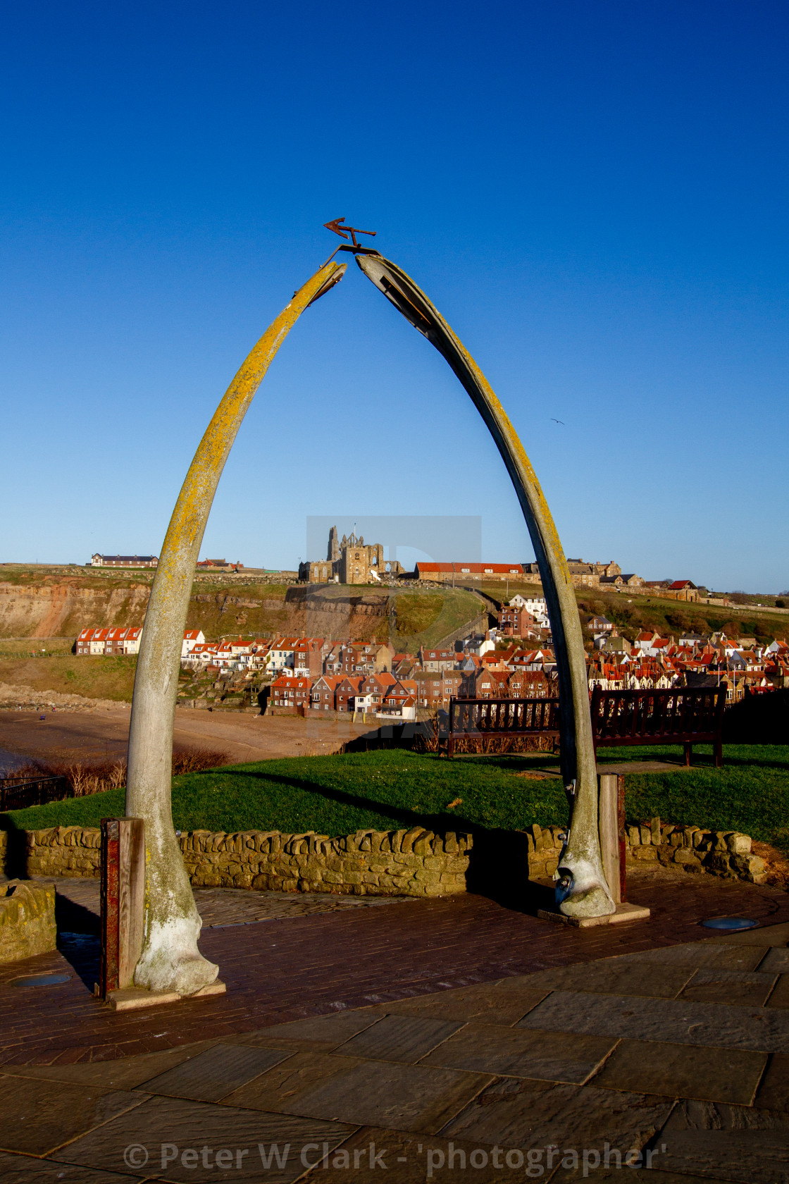 "Whitby,UK,Yorkshire,East coast, Monuments, the Whalebone Arch. Whitby Abbey in the background." by Peter W. Clark - 'photographer' - £20.00 "Whitby,UK,Yorkshire,East coast, Monuments, the Whalebone Arch. Whitby Abbey in the background." stock image