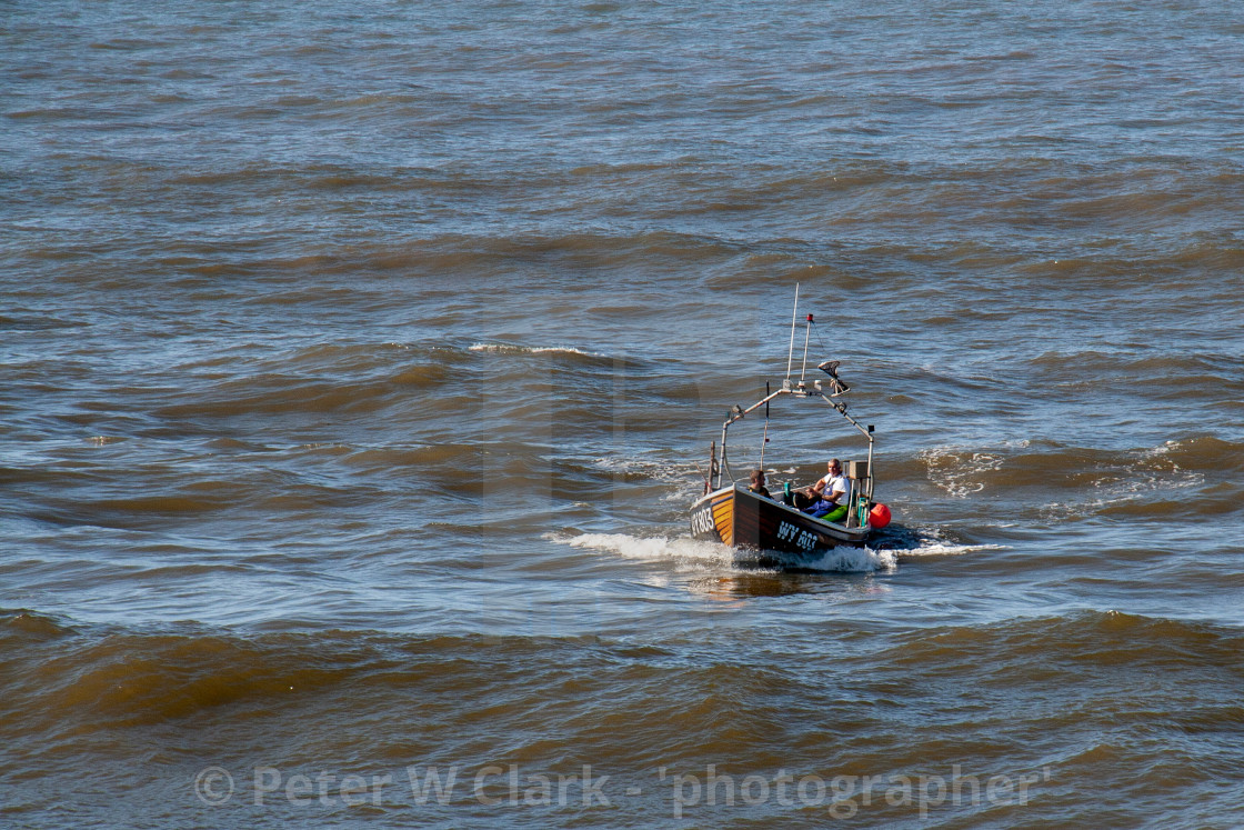"Whitby Fishing Boat WY803 Ran Returning to Whitby Harbour. Yorkshire, England." by Peter W. Clark - 'photographer' - £15.00 "Whitby Fishing Boat WY803 Ran Returning to Whitby Harbour. Yorkshire, England." stock image