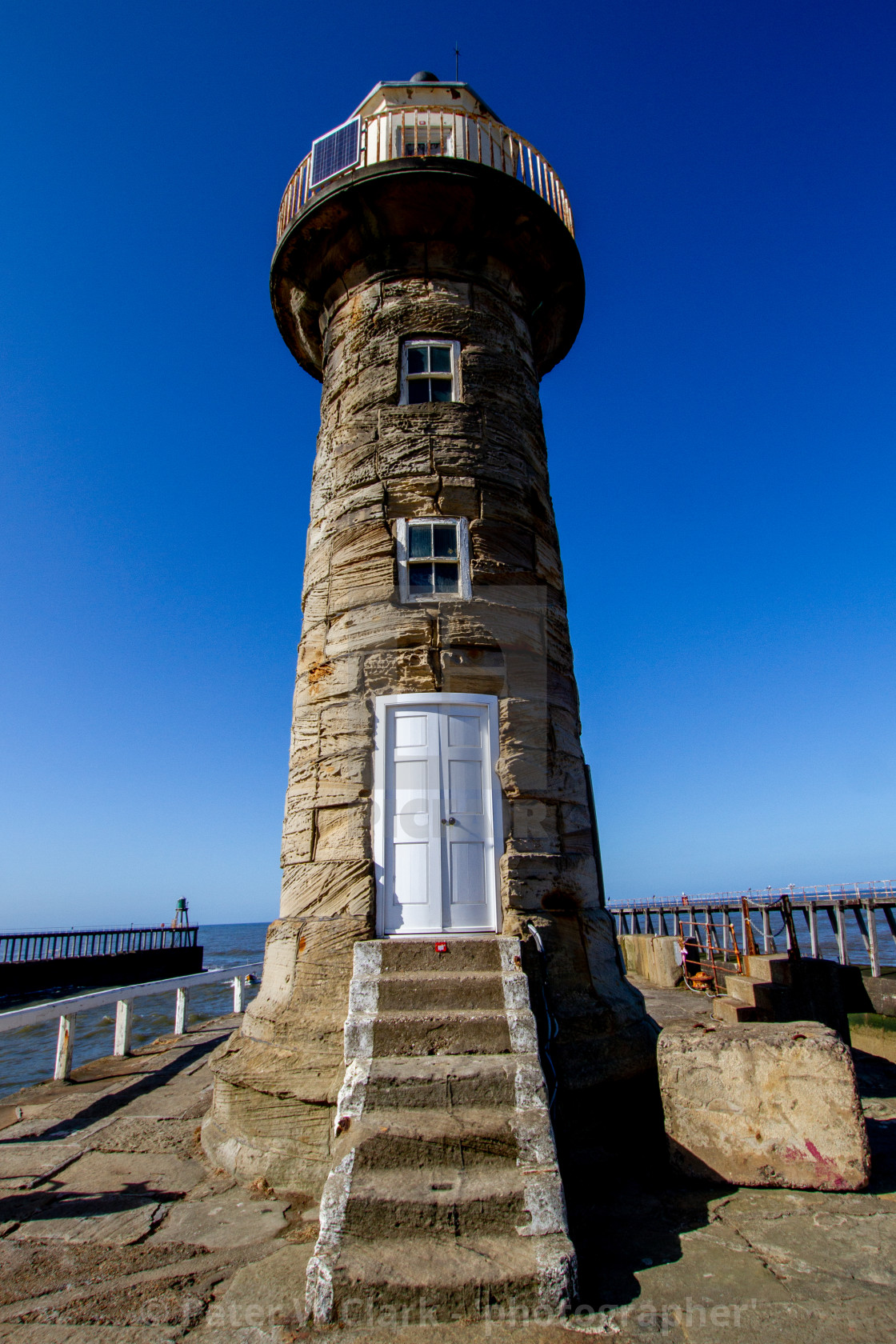 "Whitby,UK,Yorkshire,East coast, East Pier Old Lighthouse." by Peter W. Clark - 'photographer' - £10.00 "Whitby,UK,Yorkshire,East coast, East Pier Old Lighthouse." stock image