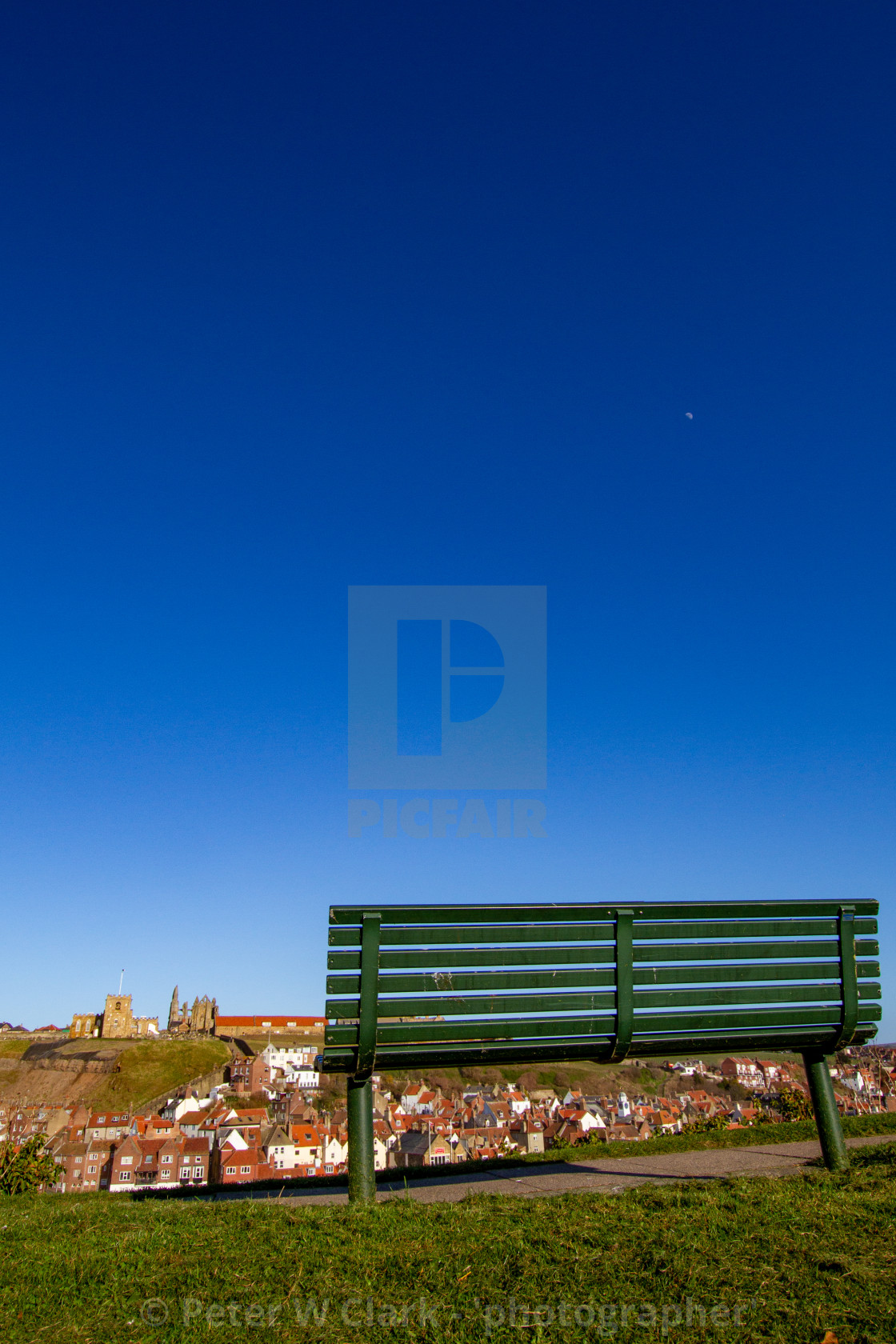 "Whitby,UK,Yorkshire,East coast, Best Viewing Seat in Whitby Overlooking the Khyber Pass, Harbour, Abbey and St Mary's Church." by Peter W. Clark - 'photographer' - £20.00 "Whitby,UK,Yorkshire,East coast, Best Viewing Seat in Whitby Overlooking the Khyber Pass, Harbour, Abbey and St Mary's Church." stock image