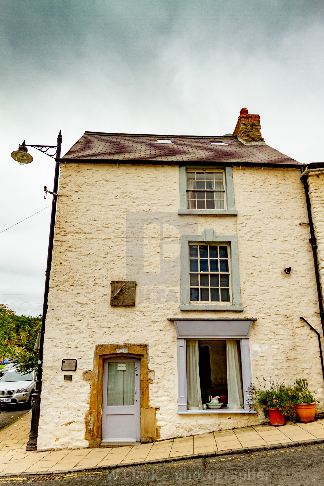 "Richmond, Yorkshire, Bridge Street, East Sundial and Plaque. Sundial Shop," by Peter W. Clark - 'photographer' - £15.00 "Richmond, Yorkshire, Bridge Street, East Sundial and Plaque. Sundial Shop," stock image