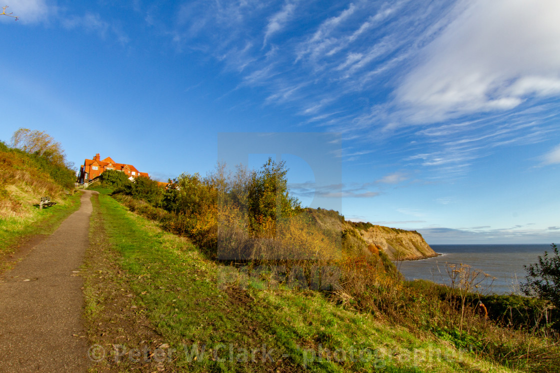 "View of the cliffs at Robin Hoods Bay on a Sunny Morning." by Peter W. Clark - 'photographer' - £15.00 "View of the cliffs at Robin Hoods Bay on a Sunny Morning." stock image