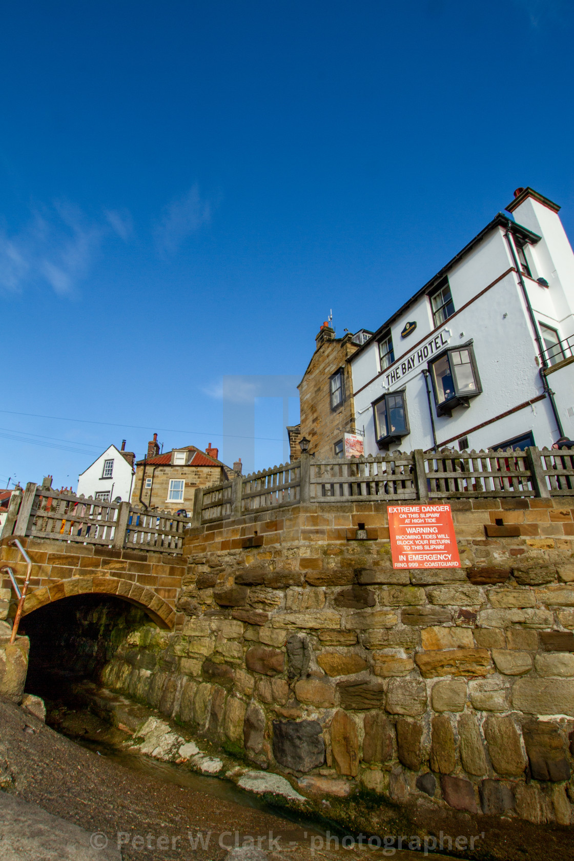 "The Bay Hotel and smugglers tunnel, Robin Hoods Bay, Yorkshire, England." by Peter W. Clark - 'photographer' - £15.00 "The Bay Hotel and smugglers tunnel, Robin Hoods Bay, Yorkshire, England." stock image