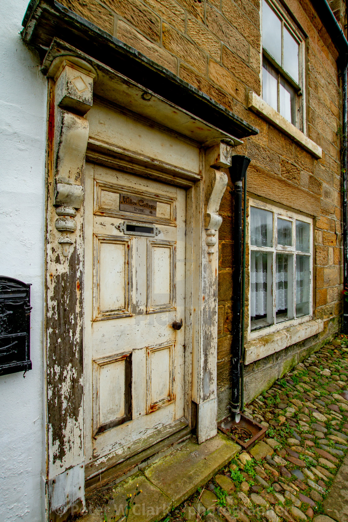 "Robin Hoods Bay, Entrance Door and Surround, Willow Cottage, Fisher Head" by Peter W. Clark - 'photographer' - £15.00 "Robin Hoods Bay, Entrance Door and Surround, Willow Cottage, Fisher Head" stock image