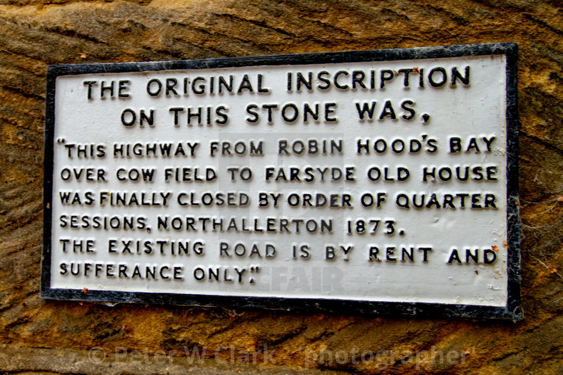 "Replica Inscription Plaque on Stone Wall, Robin Hoods Bay, Yorkshire, UK" by Peter W. Clark - 'photographer' - £10.00 "Replica Inscription Plaque on Stone Wall, Robin Hoods Bay, Yorkshire, UK" stock image
