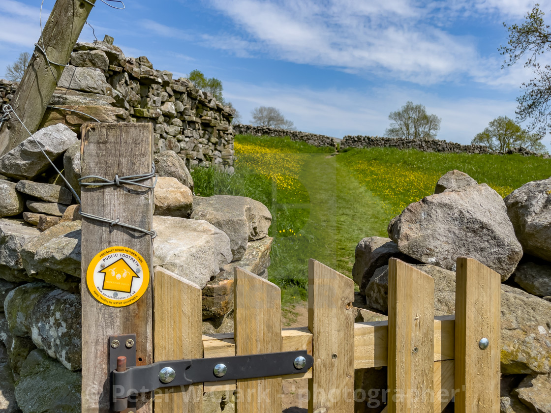 "Public Footpath Stile with Gate in Dry Stone Wall, Reeth, Swaledale." by Peter W. Clark - 'photographer' - £10.00 "Public Footpath Stile with Gate in Dry Stone Wall, Reeth, Swaledale." stock image