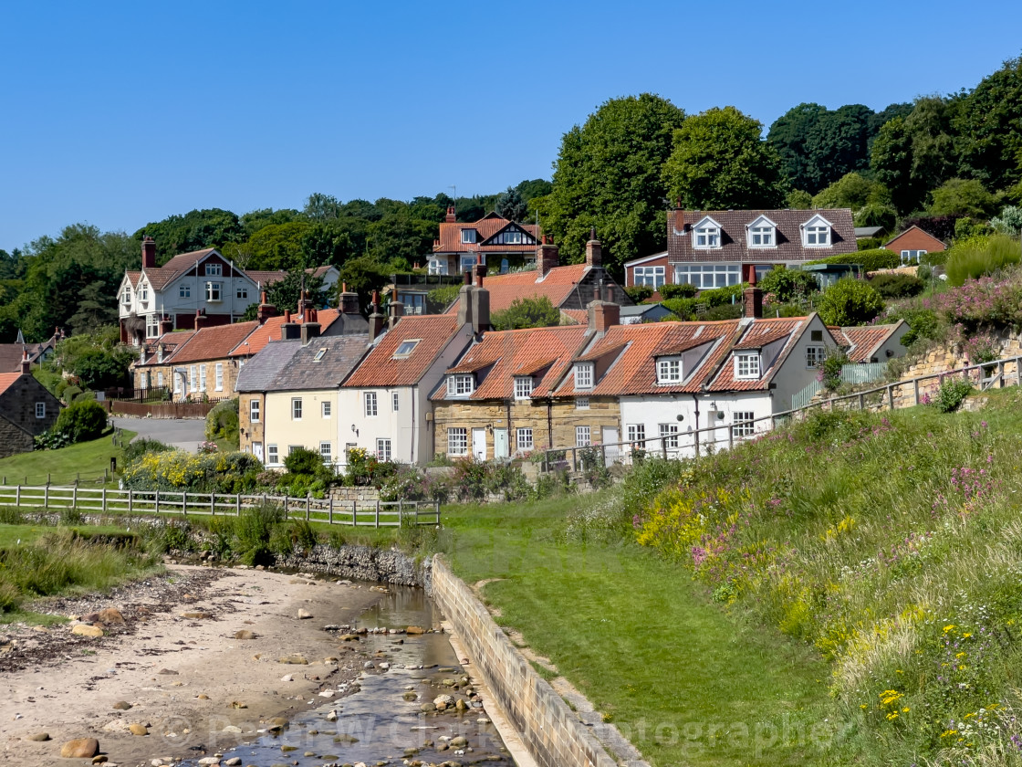 "Sandsend, Quaint Coastal Cottages" by Peter W. Clark - 'photographer' - £10.00 "Sandsend, Quaint Coastal Cottages" stock image